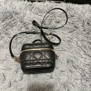 CHRISTIAN DIOR
Lambskin Cannage Micro Vanity